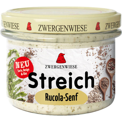 Glas mit Rucola-Senf-Aufstrich, grüne und cremige Konsistenz, ideal zum Verfeinern von Sandwiches und Gerichten.