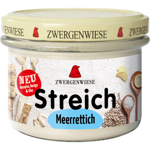 Glas mit cremigem Meerrettich-Aufstrich, ideal zum Verfeinern von Gerichten und als würzige Beilage.