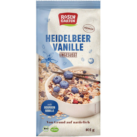 Packung Heidelbeer-Vanille Müsli ungesüßt, eine gesunde Mischung aus Haferflocken, getrockneten Heidelbeeren und Vanille, ideal für ein nahrhaftes Frühstück.