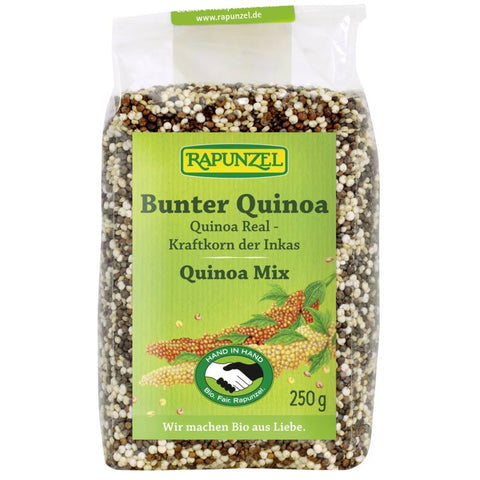 Eine Mischung aus bunter Quinoa in einer Schüssel, bestehend aus weißen, roten und schwarzen Quinoakörnern. Perfekt für gesunde und nahrhafte Mahlzeiten.