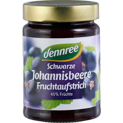 Glas mit schwarzem Johannisbeeraufstrich, gefüllt mit fruchtiger, dunkelvioletter Marmelade aus frischen schwarzen Johannisbeeren.