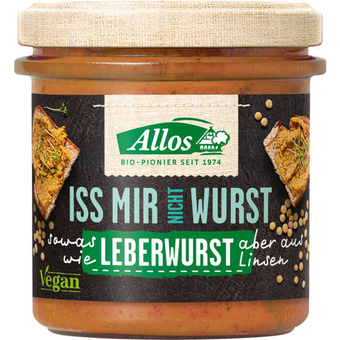 Eine Packung der veganen Leberwurst Iss mir nicht Wurst auf einem weißen Hintergrund. Die Verpackung ist grün und zeigt das Logo der Marke sowie eine Abbildung der Leberwurst.