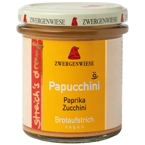 Glas mit Papucchini Brotaufstrich, einer cremigen Mischung aus Paprika und Zucchini, ideal für Brot und Brötchen.