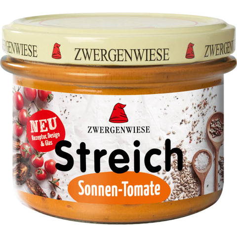 Glas mit Aufstrich Sonnen-Tomate, ein fruchtiger und aromatischer Brotaufstrich aus sonnengereiften Tomaten.