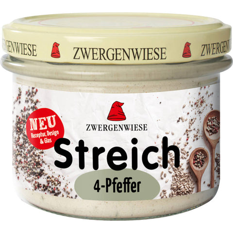 Glas mit 4-Pfeffer Streich, einer würzigen und cremigen Aufstrichmischung aus verschiedenen Pfeffersorten, ideal für Brot und Cracker.