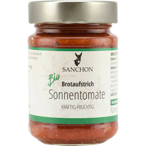 Glas mit Sonnentomate Brotaufstrich, ein veganer und fruchtiger Aufstrich aus sonnengereiften Tomaten, ideal für Brot und Brötchen.