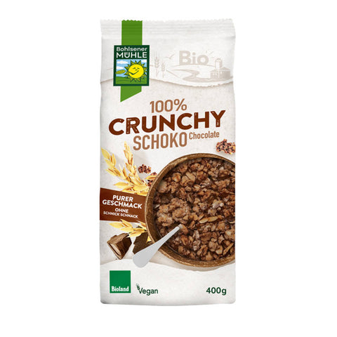 Eine Packung 100 % Schoko Crunchy Müsli, gefüllt mit knusprigen Schokoladenstückchen und knusprigen Getreideflocken, perfekt für ein schokoladiges Frühstück oder einen leckeren Snack.