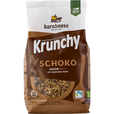 Eine Packung Krunchy Schoko Müsli, gefüllt mit knusprigen Haferflocken und reichhaltigen Schokoladenstückchen. Perfekt für ein leckeres und energiereiches Frühstück.