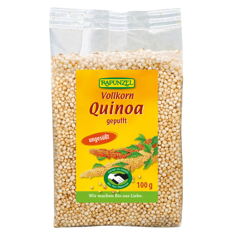 Eine Packung gepuffter Vollkorn-Quinoa, ideal als gesunde Ergänzung zu Müsli, Joghurt oder als Snack.