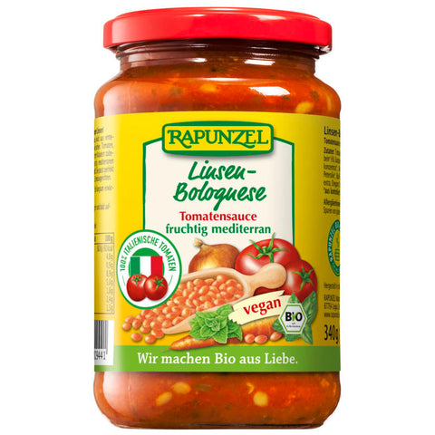 Glas mit Tomatensauce Linsen-Bolognese, eine vegane Alternative zur klassischen Bolognese-Sauce, reich an Linsen und aromatischen Gewürzen.