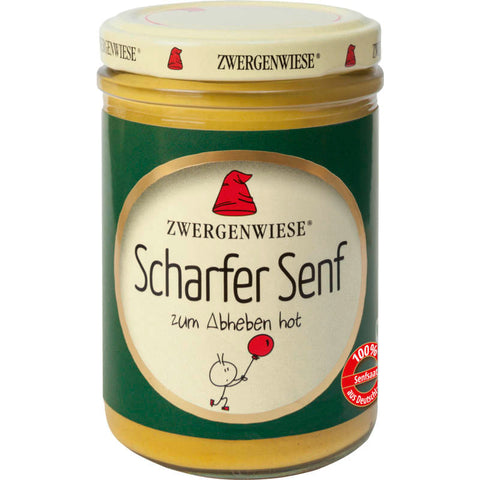 Scharfer Senf in einem Glasbehälter mit gelbem Etikett, ideal zum Würzen und Verfeinern von Speisen.