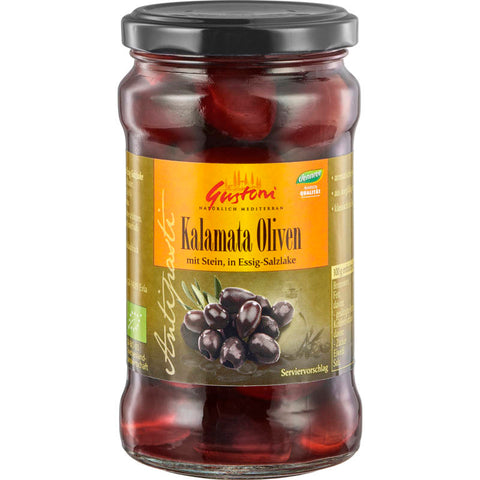 Ein Glas Kalamata Oliven in Lake, gefüllt mit saftigen, dunkelvioletten Oliven, die für ihren reichen, fruchtigen Geschmack bekannt sind.