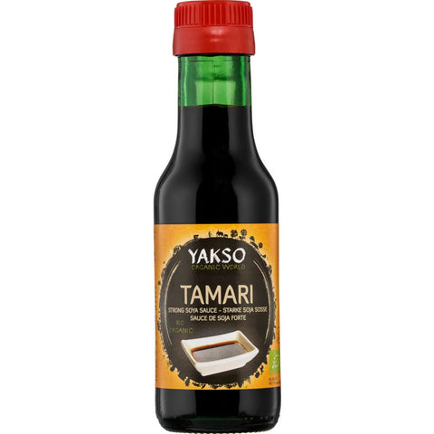 Flasche glutenfreie Sojasauce Tamari, ideal für Menschen mit Glutenunverträglichkeit, perfekt zum Würzen von asiatischen Gerichten.