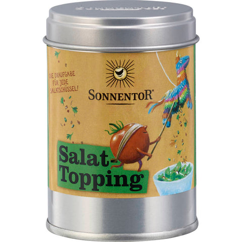 Salattopping Gewürzzubereitung in einer transparenten Gewürzdose, gefüllt mit einer bunten Mischung aus getrockneten Kräutern und Gewürzen, ideal zum Verfeinern von Salaten und anderen Gerichten.