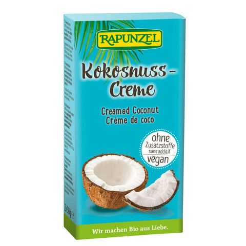 Ein Glas mit Kokosnuss-Creme, gefüllt mit cremiger, weißer Kokosnussmasse. Die Verpackung ist schlicht und elegant gestaltet, mit einem Etikett, das eine frische Kokosnuss und den Produktnamen zeigt. Perfekt für Desserts, Brotaufstriche oder zum Verfeinern von Gerichten.