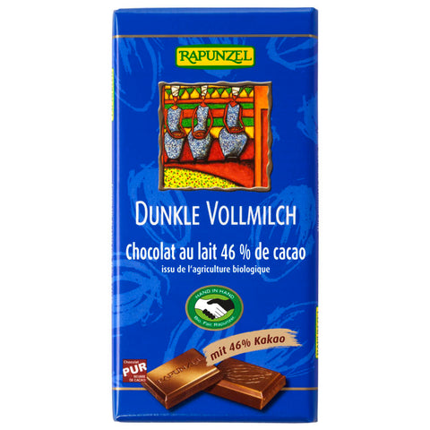 Dunkle Vollmilch Schokolade 46% Kakaoanteil, zartschmelzend und reichhaltig im Geschmack, in einer eleganten Verpackung.