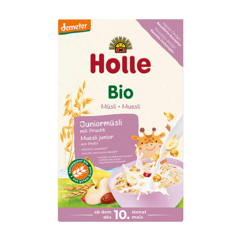 Eine Schale Juniormüsli mit frischen Früchten, ideal für Kinder. Enthält eine bunte Mischung aus Haferflocken, getrockneten Beeren und Apfelstückchen, perfekt für ein gesundes Frühstück.