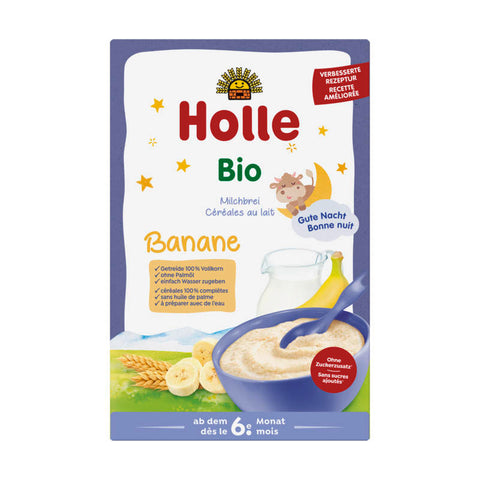 Milchbrei Banane in einer Schüssel, umgeben von frischen Bananen und einem Löffel, ideal für eine nahrhafte Mahlzeit für Babys und Kleinkinder.